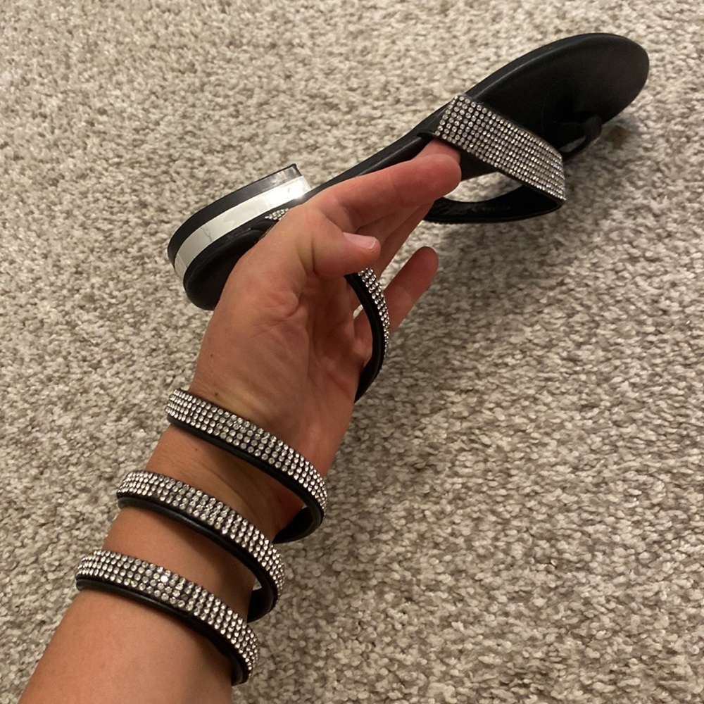 Boutique sandals with spiral around ankle